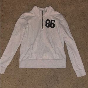 Victoria Secret sweatshirt.